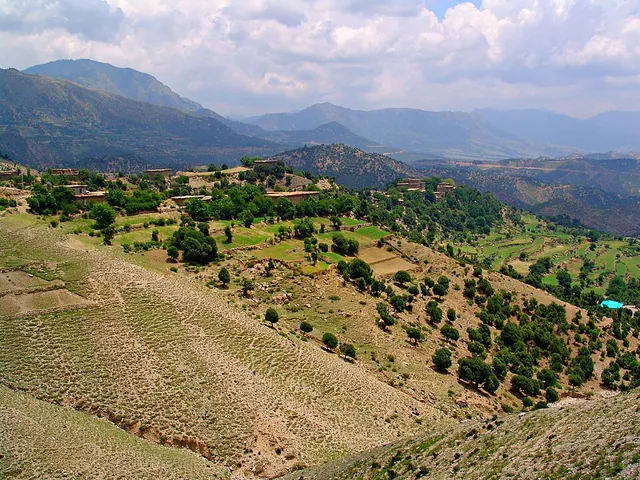 Terraced hillsides and a village in the tribal areas near the Afghan border
